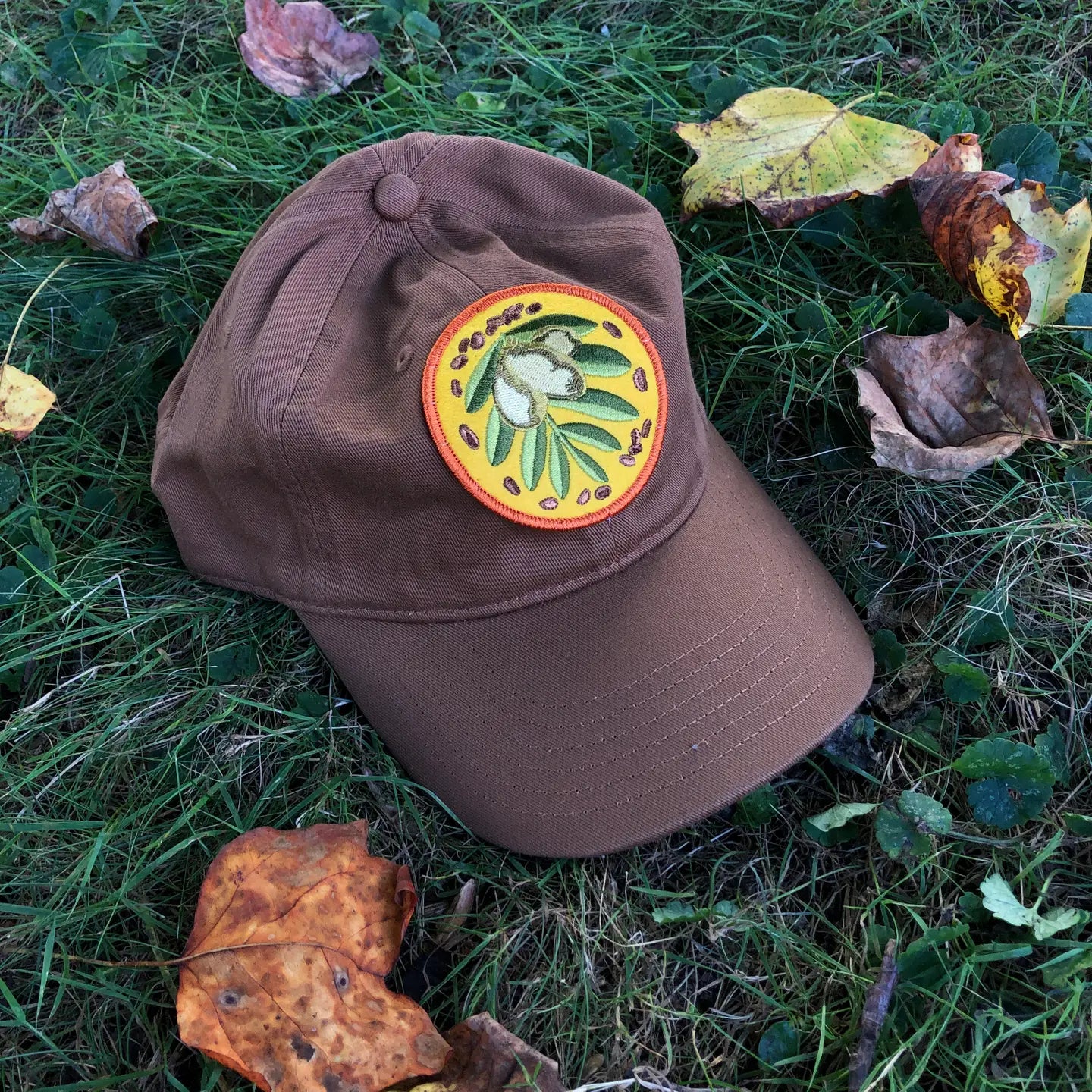 Brown baseball hat with Paw Paw embroidered patch