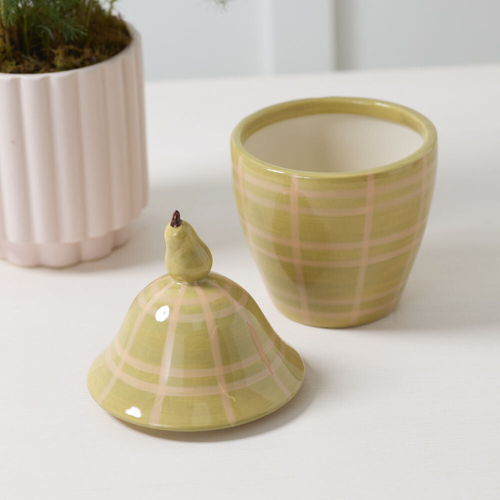 Green ceramic canister with a lid and decorative pear handle 